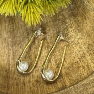 Long gold pearl drop earrings