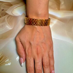A gold kada bracelet