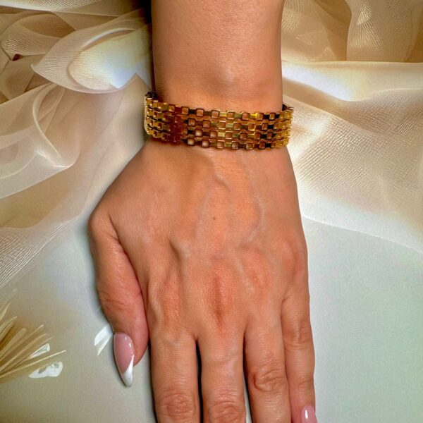 A gold kada bracelet