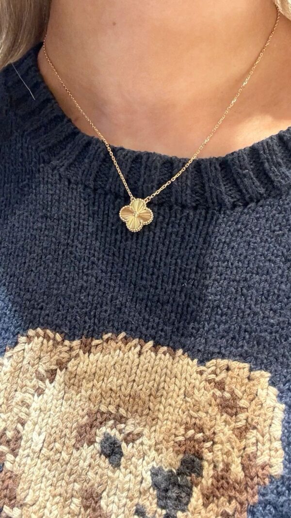 Gold clover pendant