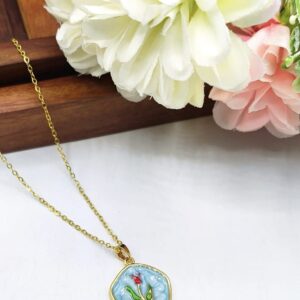 Hand painted rose and blue sea pendant