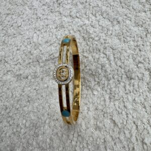 Gucci inspired gold plated bracelet with blue stone and accent stone